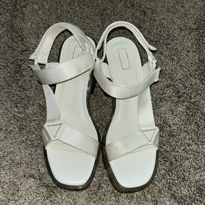 White sandals with a chunky 3 inch heel
